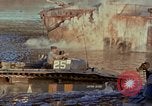 Image of Accidental fire destroys LSTs at West Loch, Pearl Harbor Oahu Hawaii USA, 1944, second 50 stock footage video 65675056760