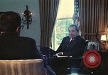 Image of Nixon talking to Kissinger in Oval Office Washington DC USA, 1973, second 4 stock footage video 65675057083
