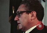 Image of Nixon talking to Kissinger in Oval Office Washington DC USA, 1973, second 10 stock footage video 65675057083