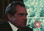 Image of Nixon talking to Kissinger in Oval Office Washington DC USA, 1973, second 14 stock footage video 65675057083