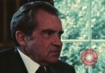 Image of Nixon talking to Kissinger in Oval Office Washington DC USA, 1973, second 15 stock footage video 65675057083