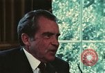 Image of Nixon talking to Kissinger in Oval Office Washington DC USA, 1973, second 16 stock footage video 65675057083