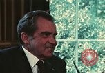Image of Nixon talking to Kissinger in Oval Office Washington DC USA, 1973, second 17 stock footage video 65675057083