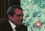 Image of Nixon talking to Kissinger in Oval Office Washington DC USA, 1973, second 19 stock footage video 65675057083