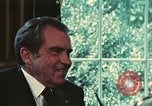 Image of Nixon talking to Kissinger in Oval Office Washington DC USA, 1973, second 21 stock footage video 65675057083