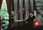 Image of Nixon talking to Kissinger in Oval Office Washington DC USA, 1973, second 27 stock footage video 65675057083