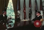Image of Nixon talking to Kissinger in Oval Office Washington DC USA, 1973, second 29 stock footage video 65675057083