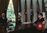 Image of Nixon talking to Kissinger in Oval Office Washington DC USA, 1973, second 33 stock footage video 65675057083