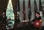 Image of Nixon talking to Kissinger in Oval Office Washington DC USA, 1973, second 34 stock footage video 65675057083