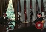 Image of Nixon talking to Kissinger in Oval Office Washington DC USA, 1973, second 35 stock footage video 65675057083