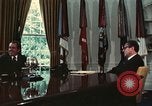 Image of Nixon talking to Kissinger in Oval Office Washington DC USA, 1973, second 37 stock footage video 65675057083
