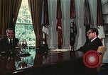 Image of Nixon talking to Kissinger in Oval Office Washington DC USA, 1973, second 38 stock footage video 65675057083