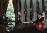Image of Nixon talking to Kissinger in Oval Office Washington DC USA, 1973, second 39 stock footage video 65675057083