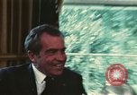 Image of Nixon talking to Kissinger in Oval Office Washington DC USA, 1973, second 41 stock footage video 65675057083