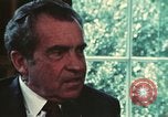 Image of Nixon talking to Kissinger in Oval Office Washington DC USA, 1973, second 43 stock footage video 65675057083