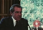 Image of Nixon talking to Kissinger in Oval Office Washington DC USA, 1973, second 47 stock footage video 65675057083