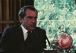 Image of Nixon talking to Kissinger in Oval Office Washington DC USA, 1973, second 48 stock footage video 65675057083