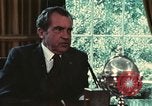 Image of Nixon talking to Kissinger in Oval Office Washington DC USA, 1973, second 49 stock footage video 65675057083