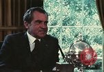 Image of Nixon talking to Kissinger in Oval Office Washington DC USA, 1973, second 51 stock footage video 65675057083