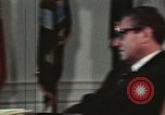 Image of Nixon talking to Kissinger in Oval Office Washington DC USA, 1973, second 52 stock footage video 65675057083