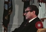 Image of Nixon talking to Kissinger in Oval Office Washington DC USA, 1973, second 55 stock footage video 65675057083