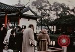 Immagine di Nixon delegazione in fiore parco Fort Hangchow Cina, 1972, secondo 55 filmato di repertorio 65675057366