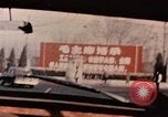 Image of Nixon motorcade in snow China, 1972, second 11 stock footage video 65675057373