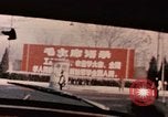 Image of Nixon motorcade in snow China, 1972, second 12 stock footage video 65675057373