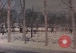 Image of Nixon motorcade in snow China, 1972, second 30 stock footage video 65675057373
