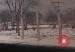 Image of Nixon motorcade in snow China, 1972, second 32 stock footage video 65675057373