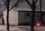 Image of Nixon motorcade in snow China, 1972, second 55 stock footage video 65675057373