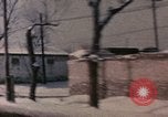 Image of Nixon motorcade in snow China, 1972, second 56 stock footage video 65675057373