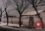 Image of Nixon motorcade in snow China, 1972, second 57 stock footage video 65675057373