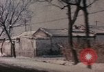 Image of Nixon motorcade in snow China, 1972, second 58 stock footage video 65675057373