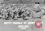 Image of Betty Grable at Army Camp Pacific Theater, 1942, second 1 stock footage video 65675057630