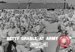 Image of Betty Grable at Army Camp Pacific Theater, 1942, second 4 stock footage video 65675057630