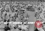Image of Betty Grable at Army Camp Pacific Theater, 1942, second 5 stock footage video 65675057630