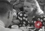 Image of Betty Grable at Army Camp Pacific Theater, 1942, second 29 stock footage video 65675057630