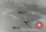 Image of aerial bombing Pacific Theater, 1945, second 16 stock footage video 65675057706