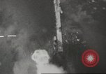 Image of aerial bombing Pacific Theater, 1945, second 18 stock footage video 65675057706