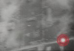 Image of aerial bombing Pacific Theater, 1945, second 25 stock footage video 65675057706