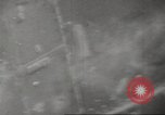 Image of aerial bombing Pacific Theater, 1945, second 27 stock footage video 65675057706
