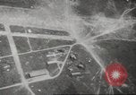Image of aerial bombing Pacific Theater, 1945, second 33 stock footage video 65675057706