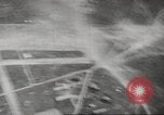 Image of aerial bombing Pacific Theater, 1945, second 36 stock footage video 65675057706