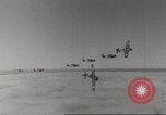 Image of aerial bombing Pacific Theater, 1945, second 38 stock footage video 65675057706