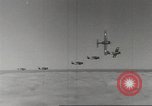 Image of aerial bombing Pacific Theater, 1945, second 40 stock footage video 65675057706