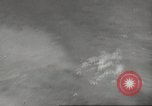 Image of aerial bombing Pacific Theater, 1945, second 44 stock footage video 65675057706