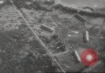 Image of aerial bombing Pacific Theater, 1945, second 49 stock footage video 65675057706