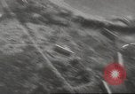 Image of aerial bombing Pacific Theater, 1945, second 50 stock footage video 65675057706