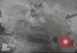 Image of aerial bombing Pacific Theater, 1945, second 52 stock footage video 65675057706
